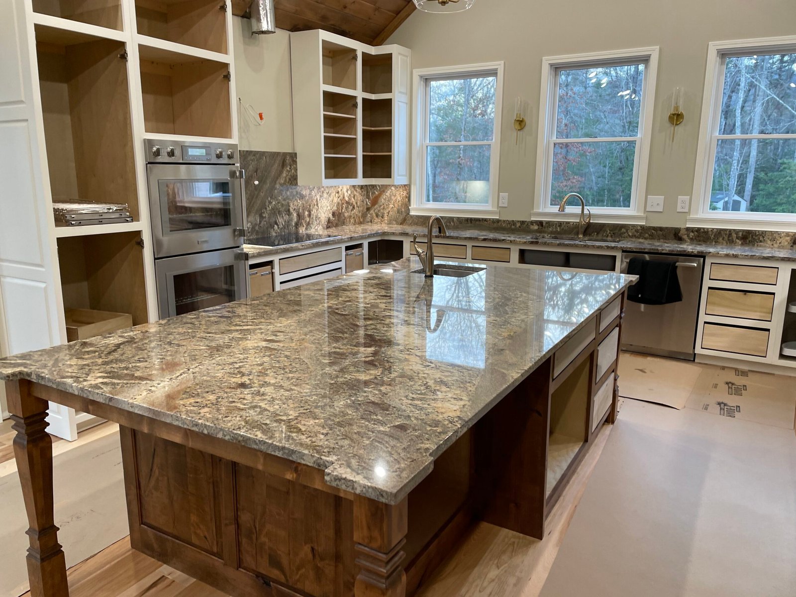 Modern kitchen showcasing quartz countertops in Canton, GA, highlighting expert installation.